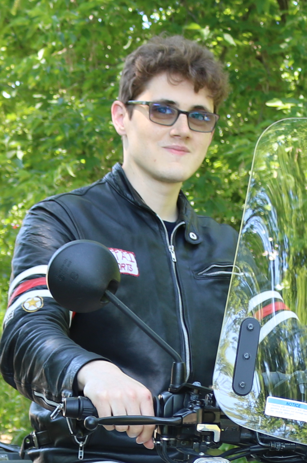 Photo of the author sitting on his motorcycle